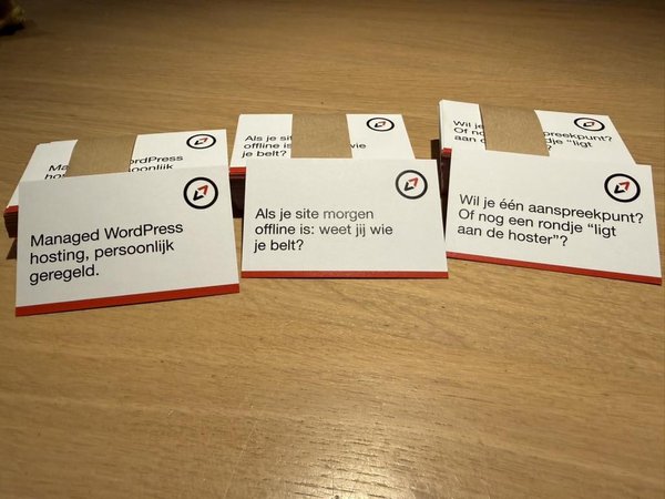 A photo of three different variants of business cards.